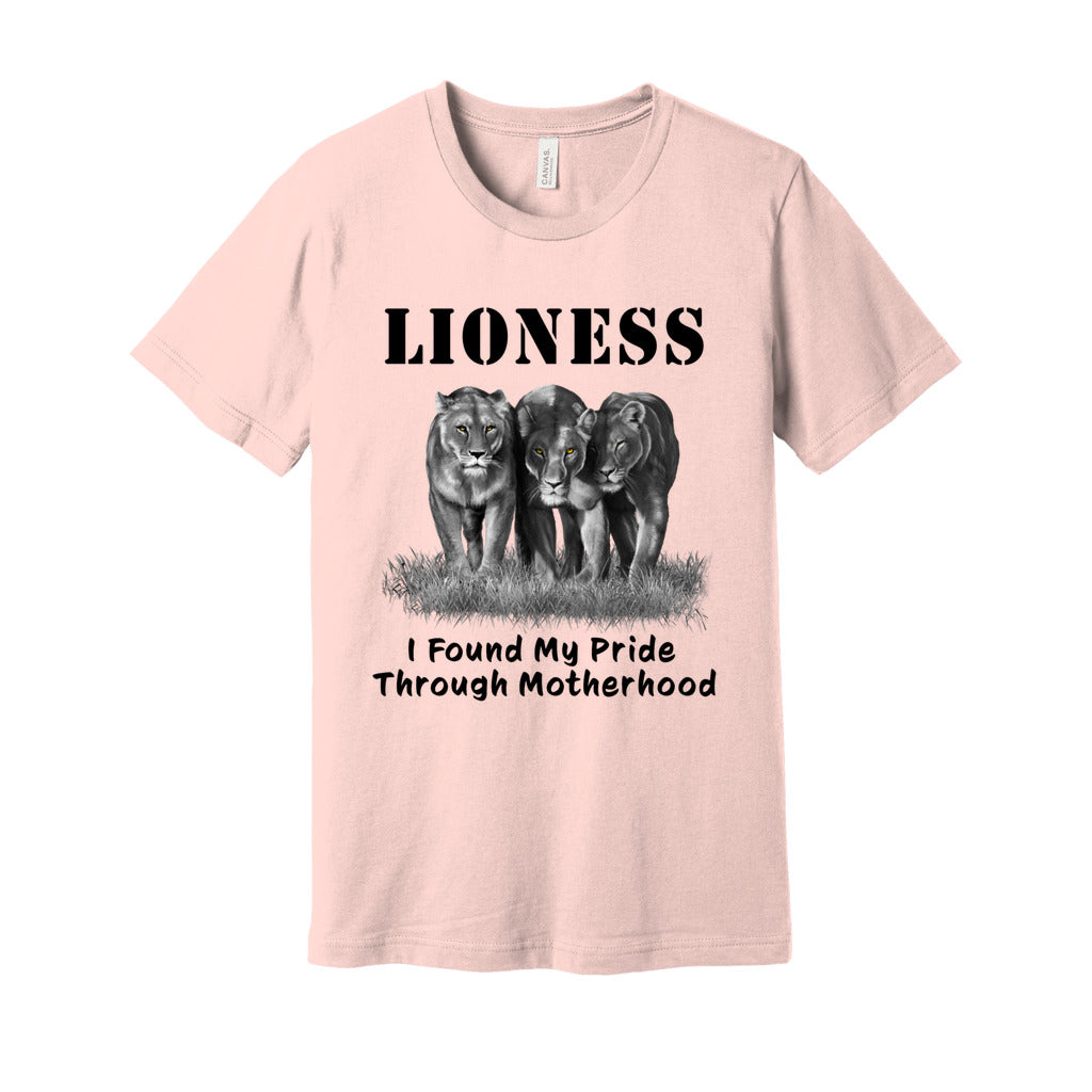 "Lioness" written above three female lions, with "I Found My Pride Through Motherhood" written below. Adult cotton T-shirt. Soft Pink.