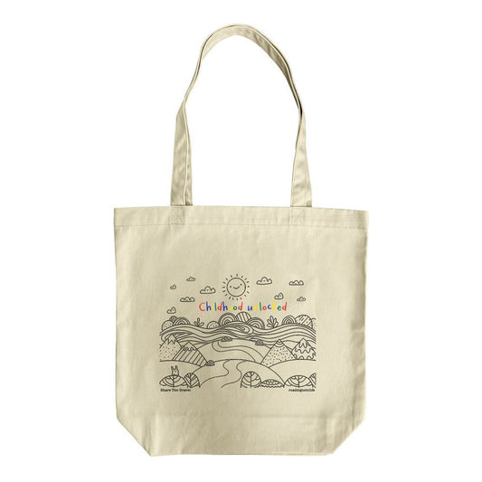 Child's line drawing of mountain range with "Childhood unlocked" written in primary colors. Organic cotton canvas tote bag.