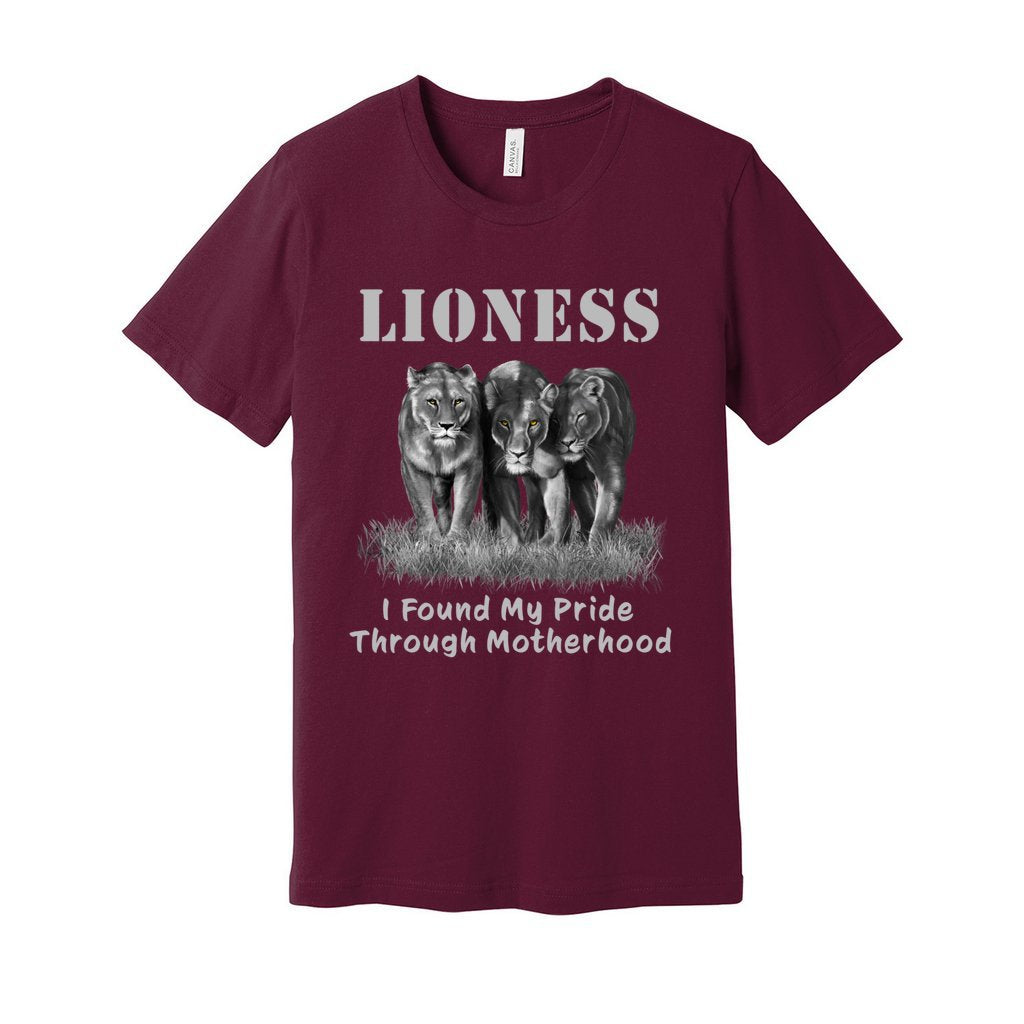 "Lioness" written above three female lions, with "I Found My Pride Through Motherhood" written below. Adult cotton T-shirt. Maroon.