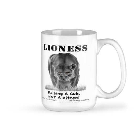 "Lioness" written above an adult female lion with her cub sitting in front of her, with "Raising A Cub, NOT A Kitten" written below. 15 oz. ceramic coffee mug.