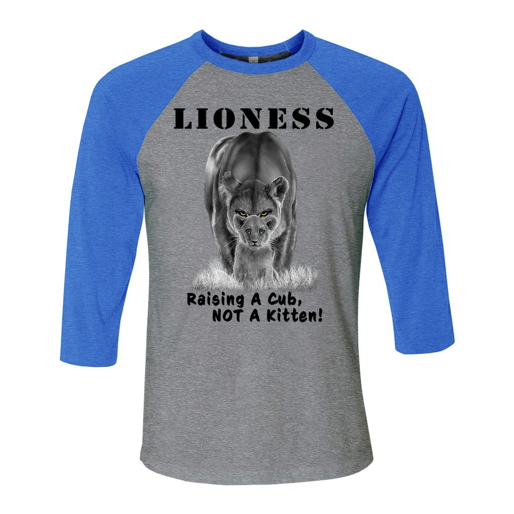 "Lioness" written above an adult female lion with her cub sitting in front of her, with "Raising A Cub, NOT A Kitten" written below. Cotton raglan jersey baseball tee. Adult t-shirt with 3/4 sleeves. Heather gray shirt with true royal blue triblend sleeves and collar.