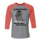 "Lioness" written above an adult female lion with her two cubs sitting in front of her, with "Raising Cubs, NOT Kittens!" written below. Cotton raglan jersey baseball tee. Adult t-shirt with 3/4 sleeves. Heather gray shirt with red triblend sleeves and collar.