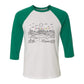 Child's line drawing of mountain range with "Childhood unlocked" written in primary colors. Cotton raglan jersey baseball tee. Adult t-shirt with 3/4 sleeves. White shirt with green sleeves and collar.