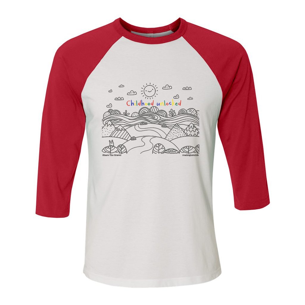 Child's line drawing of mountain range with "Childhood unlocked" written in primary colors. Cotton raglan jersey baseball tee. Adult t-shirt with 3/4 sleeves. White shirt with red sleeves and collar.