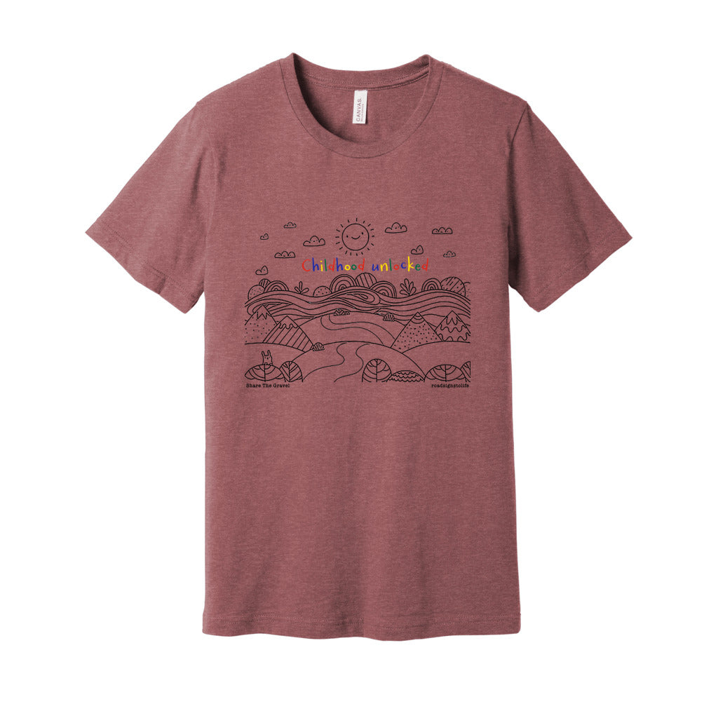 Child's line drawing of mountain range with "Childhood unlocked" written in primary colors. Adult cotton t-shirt. Heather mauve.