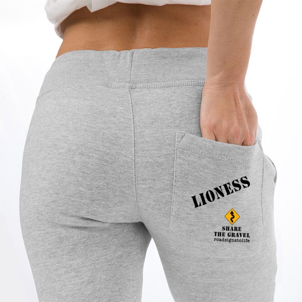 Premium jogger pants with a right, rear pocket. "Lioness" written diagonally across pocket, with "Share The Gravel" and roadsignstolife.com written on bottom right corner of pocket. Heather Gray.