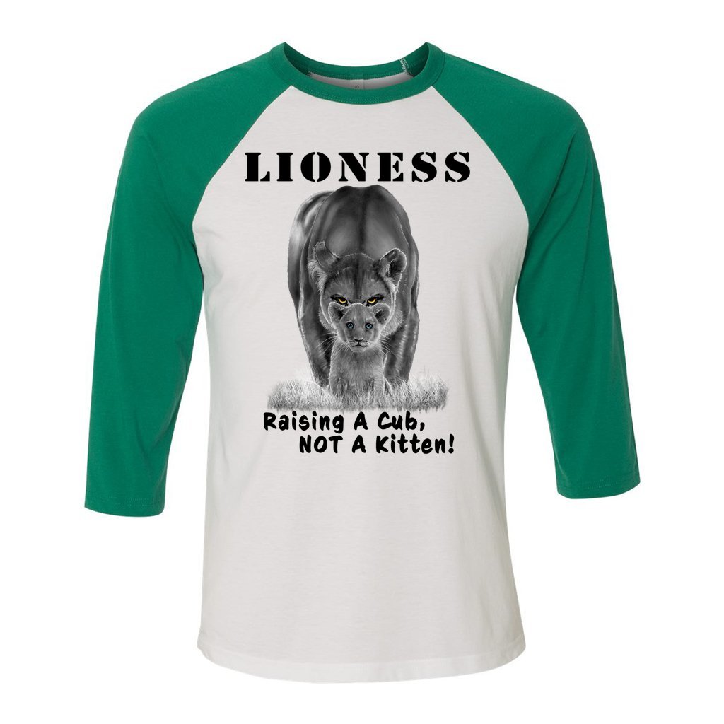"Lioness" written above an adult female lion with her cub sitting in front of her, with "Raising A Cub, NOT A Kitten" written below. Cotton raglan jersey baseball tee. Adult t-shirt with 3/4 sleeves. White shirt with kelly green sleeves and collar.