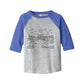 Child's line drawing of mountain range with "Childhood unlocked" written in primary colors. Cotton raglan jersey baseball tee. Toddler t-shirt with 3/4 sleeves. Heather gray shirt with blue sleeve and collar.